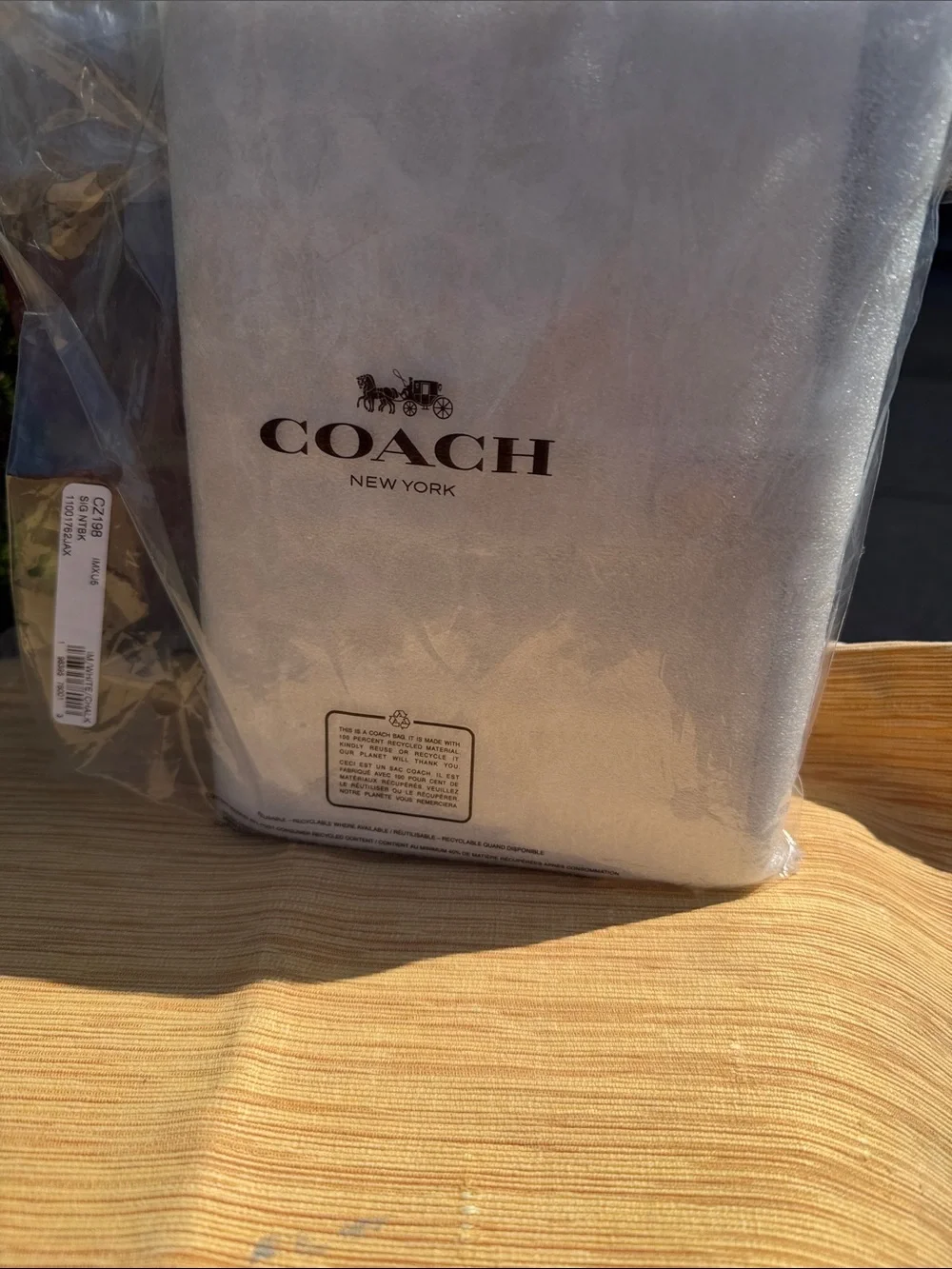 Coach Cream Signature Leather Agenda with Snap Strap Chuck and white color